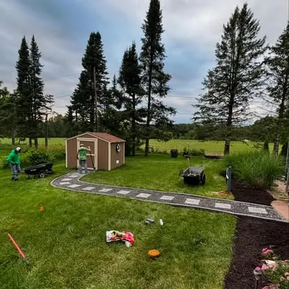 Stone patio installation by Luther Property Care
